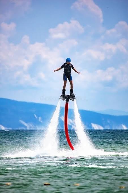 Fly boarder hovering above the water at Havelock Island